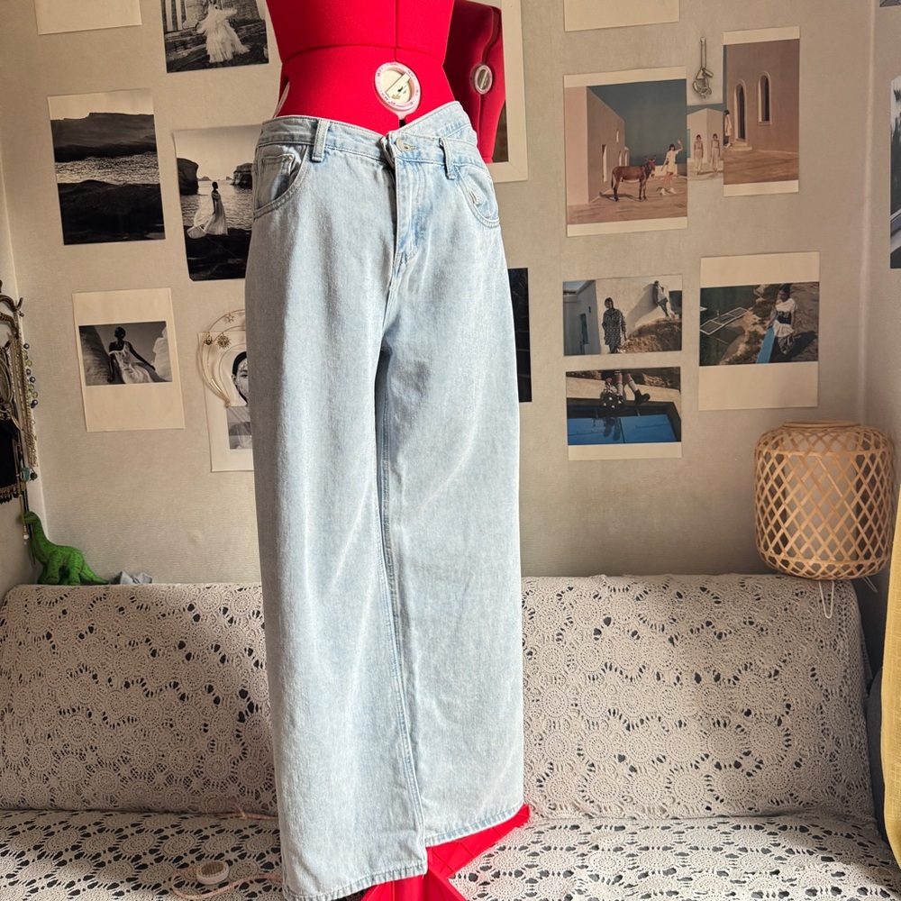 Astonishing power asymmetrical, light wide leg jeans